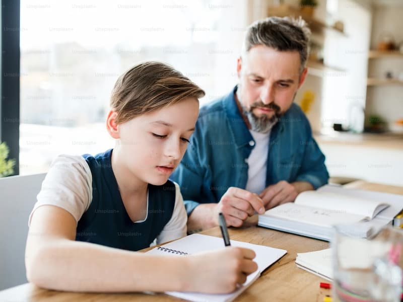 A young person slowly re-engaging with school, supported by a clinician